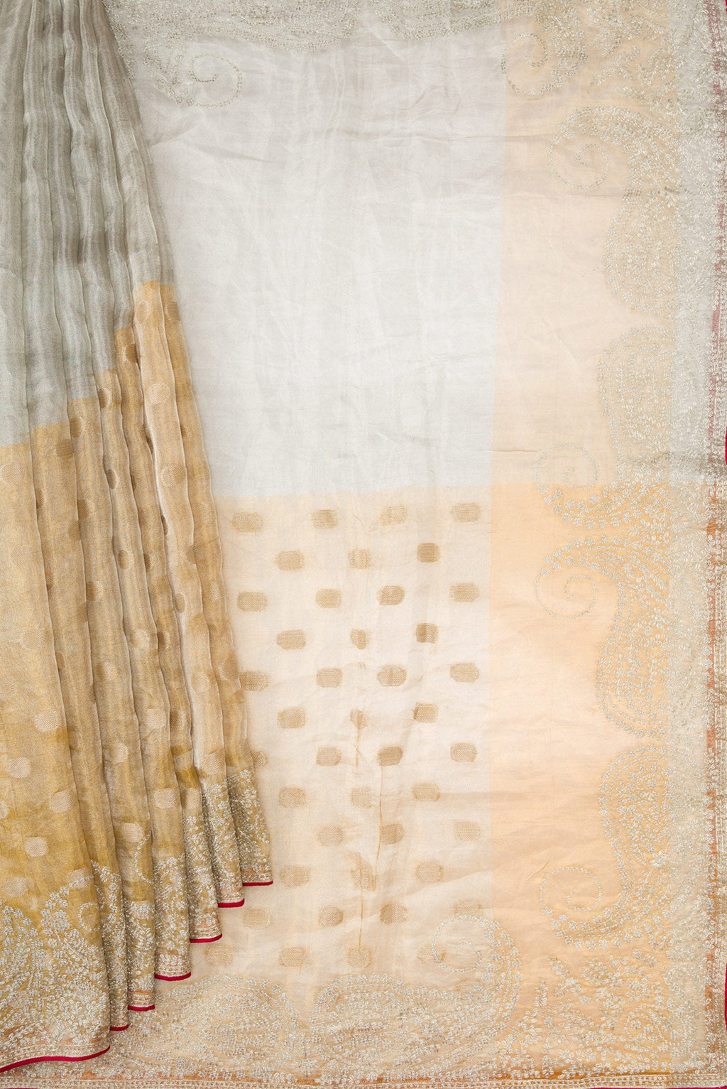 Pleats and pallu of Gold Dual Tone Organza Silk Saree with Zari Butta on the body and Embroidery Border. 
