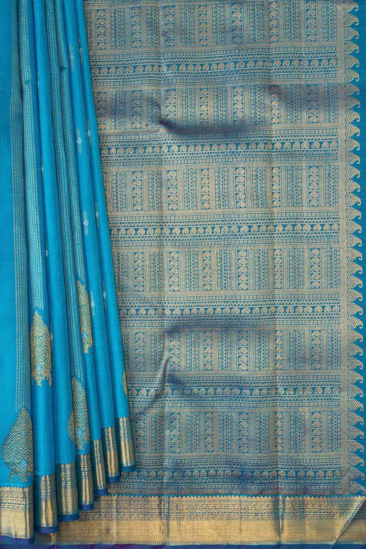 Pleats and pallu of Sky Blue Dual Tone Kanchipuram Silk Saree with Zari Butta on the body and Zari Border