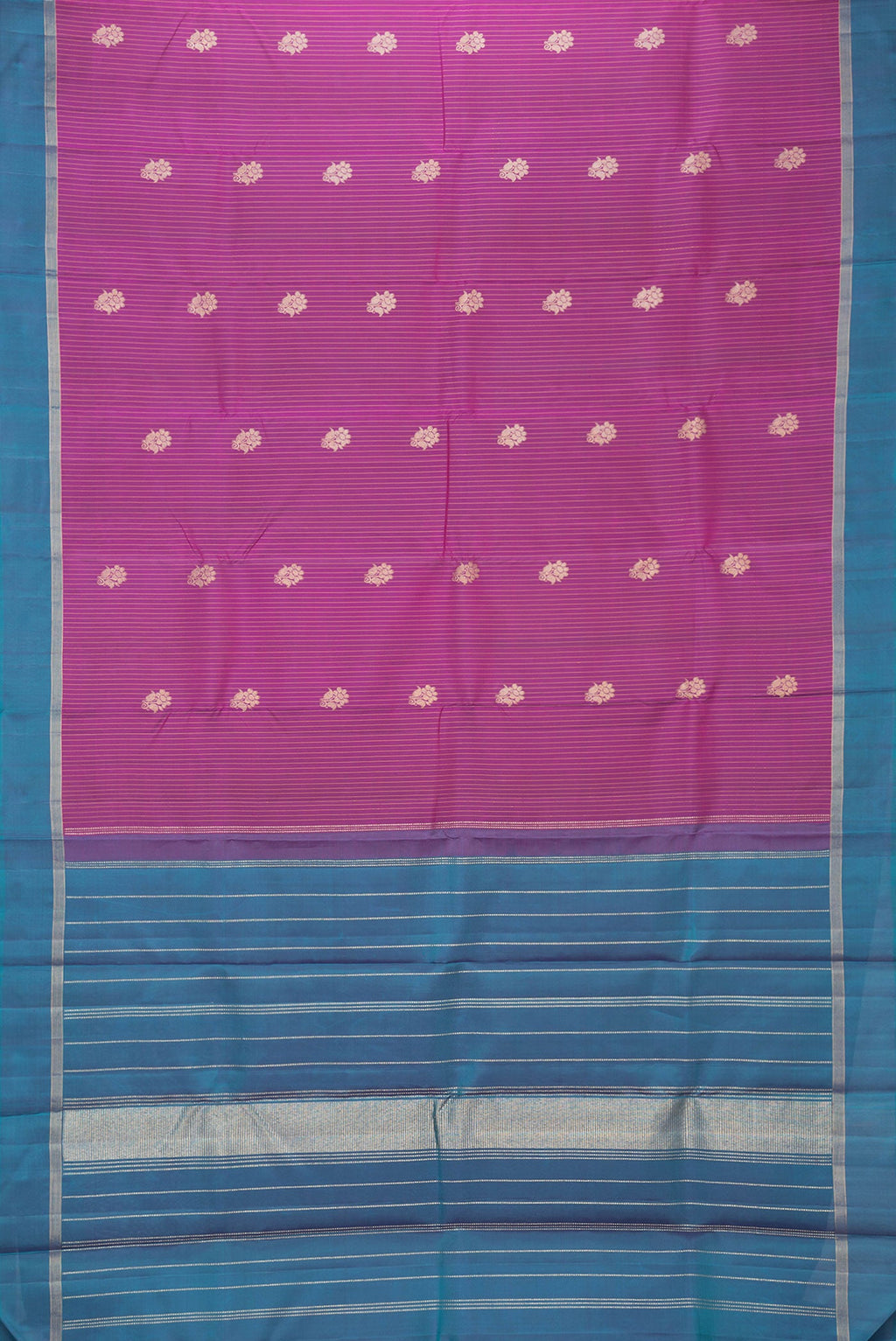 Flat view of Magenta Dual Tone Kanjivaram Silk Saree with Stripes on the body and Zari Border. 