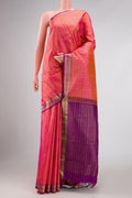 Pink with Orange Color Kanchipuram Silk Saree with Checked design on the body and Zari Border displayed on a mannequin