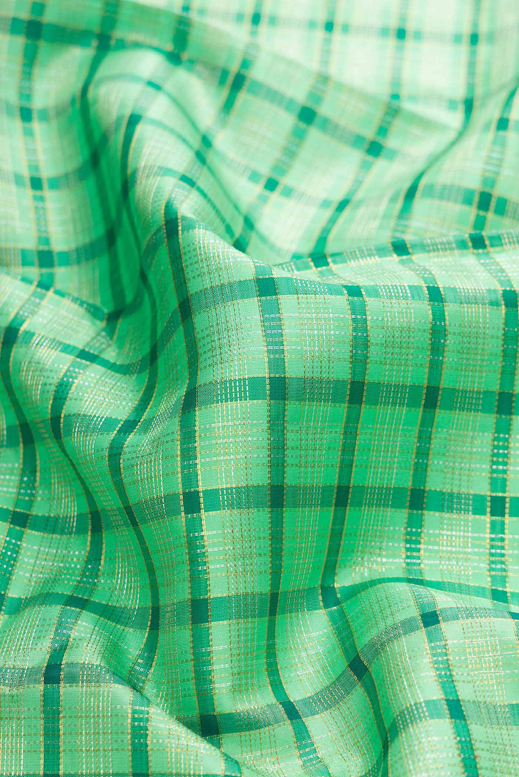 Close up of Pure Silk Pure Zari Sea Green Dual Tone Kanchipuram Saree with Checked design on the body and Zari Border displaying folds