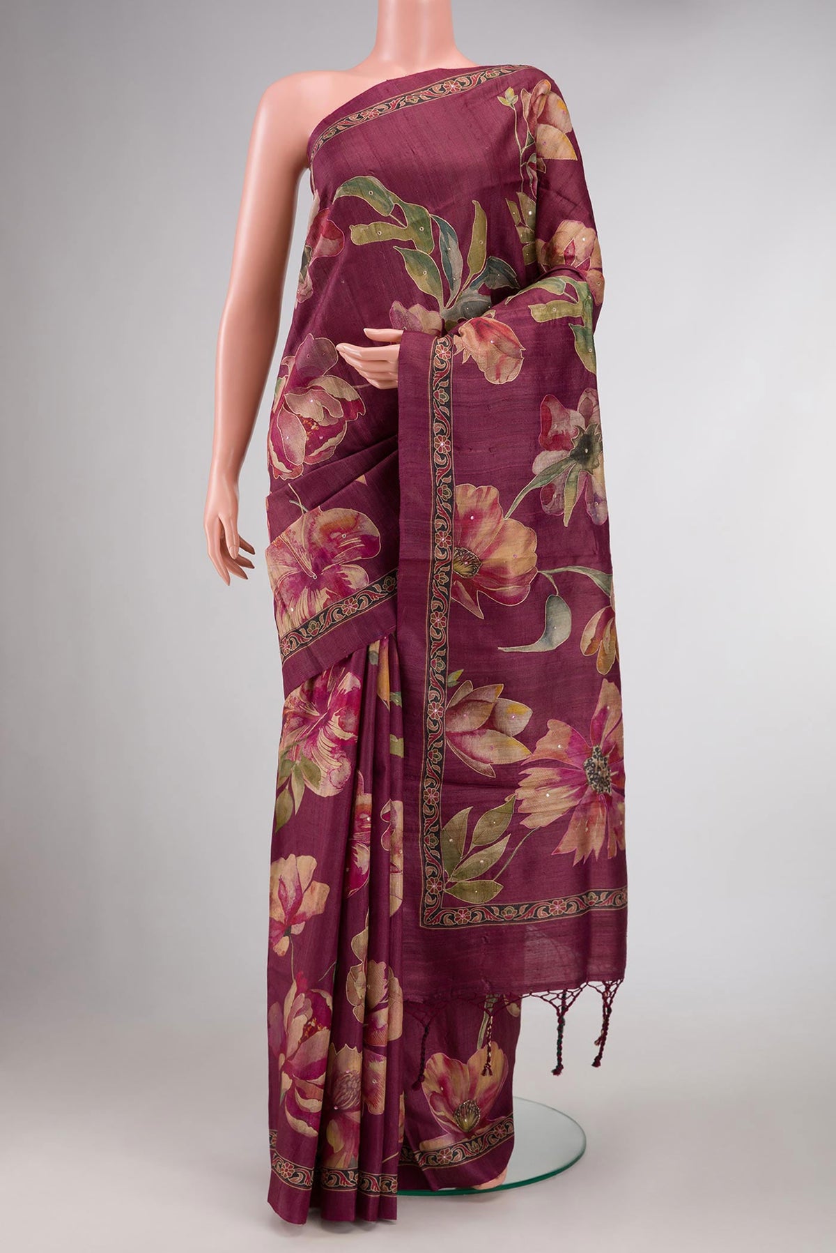 Magenta Dual Tone Tussar Silk Saree with Embroidery on the body and Embroidery Border displayed on a mannequin