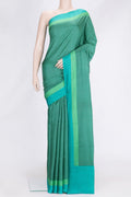 Peacock Blue Dual Tone Printed Silk Saree with Printed design on the body and Printed Border.  displayed on a mannequin