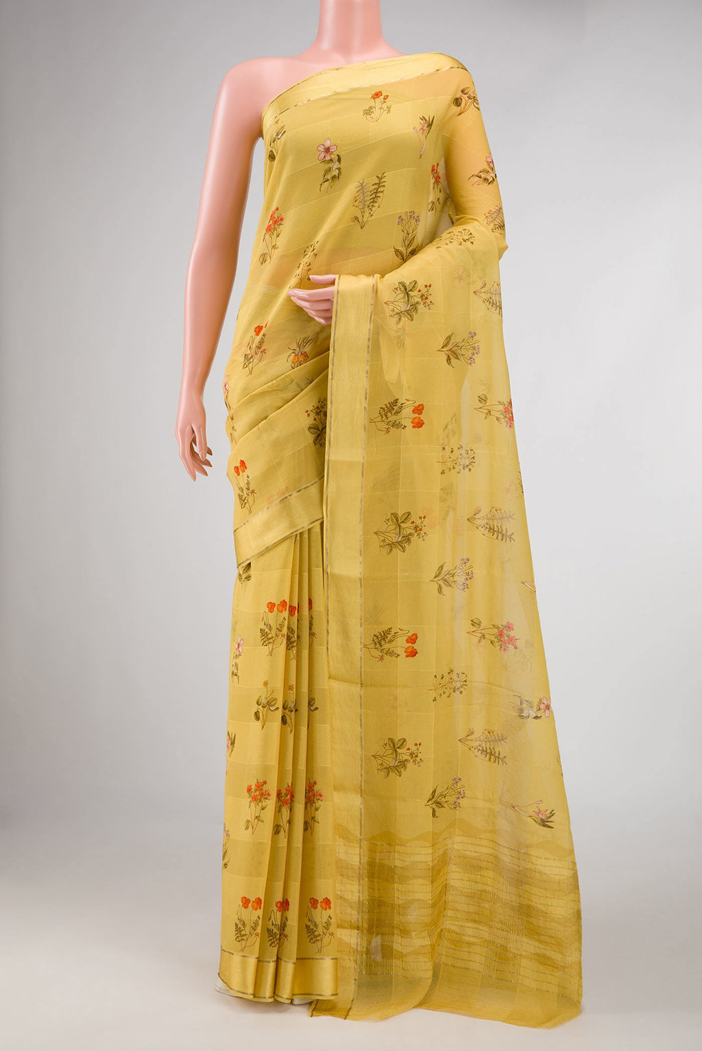 Mustard Dual Tone Mysore Georgette Saree with Printed design on the body and Zari Border displayed on a mannequin