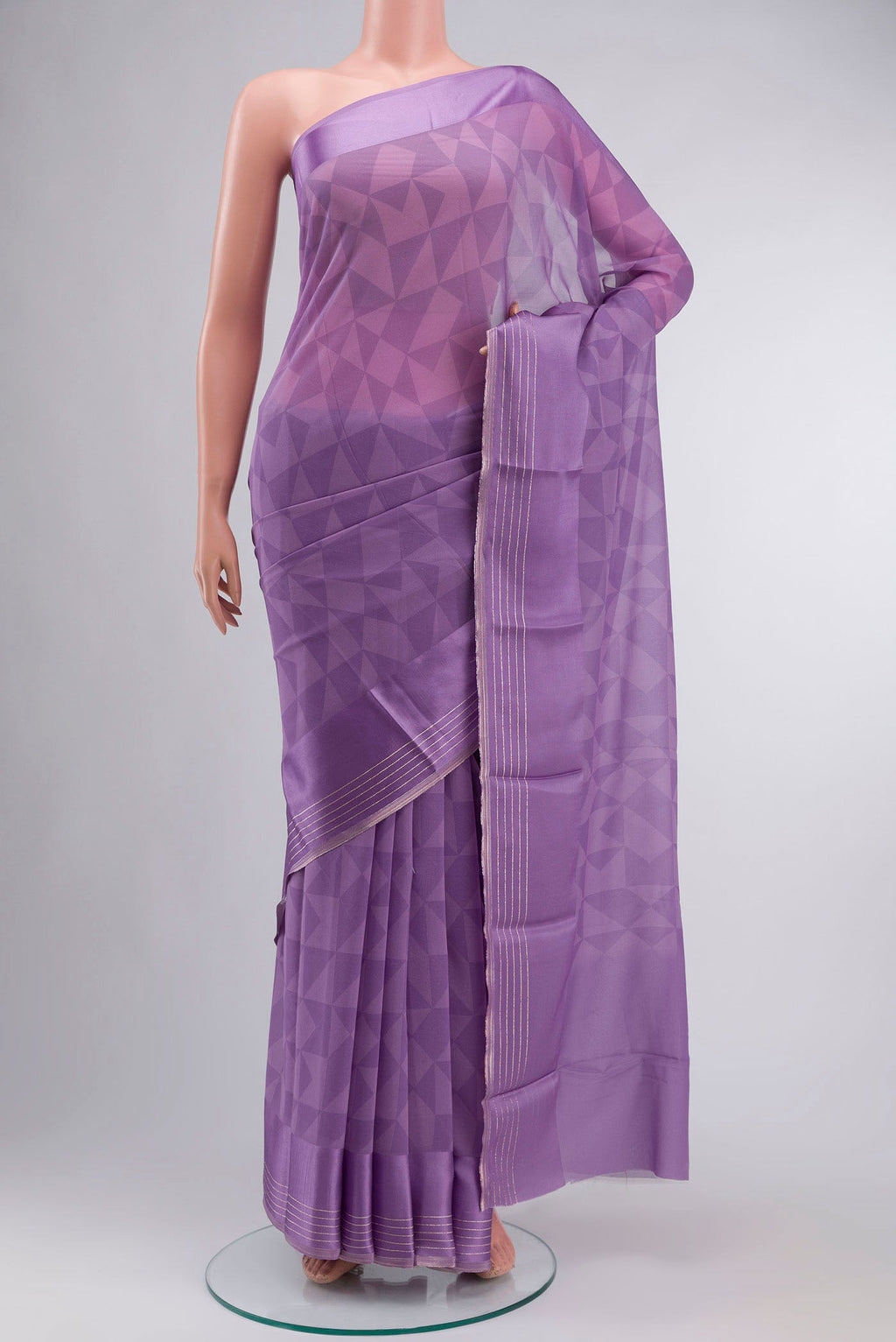 Lavender Georgette Saree Printed design on the body and Zari Border displayed on a mannequin