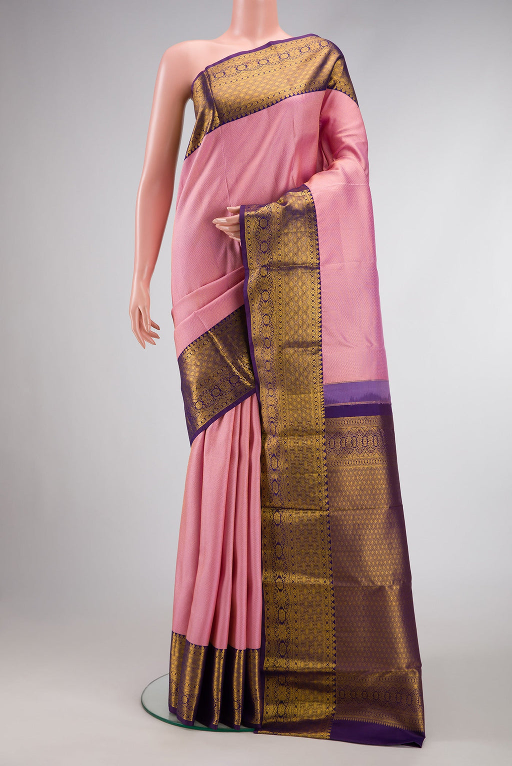 Pink Dual Tone Kanchipuram Silk Saree with Zari Brocade on the body and Zari Border.  displayed on a mannequin