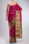 Pink Kanchipuram Silk Saree with Zari Butta on the body and Zari Border displayed on a mannequin
