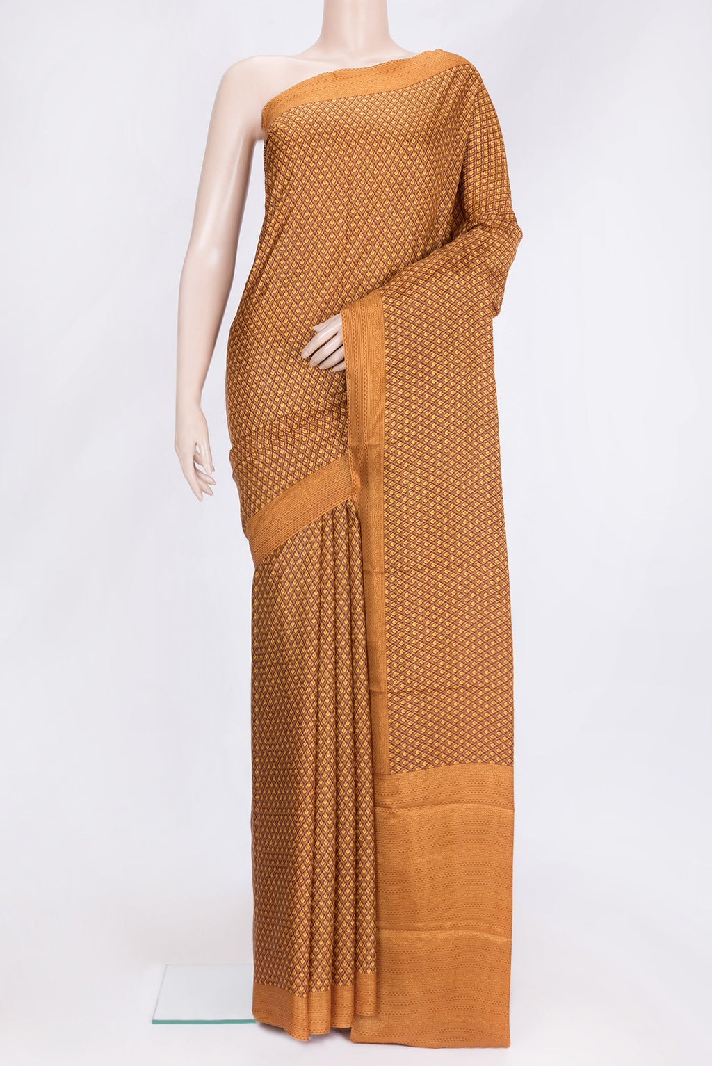 Mustard Dual Tone Printed Silk Saree with Printed design on the body and Printed Border.  displayed on a mannequin