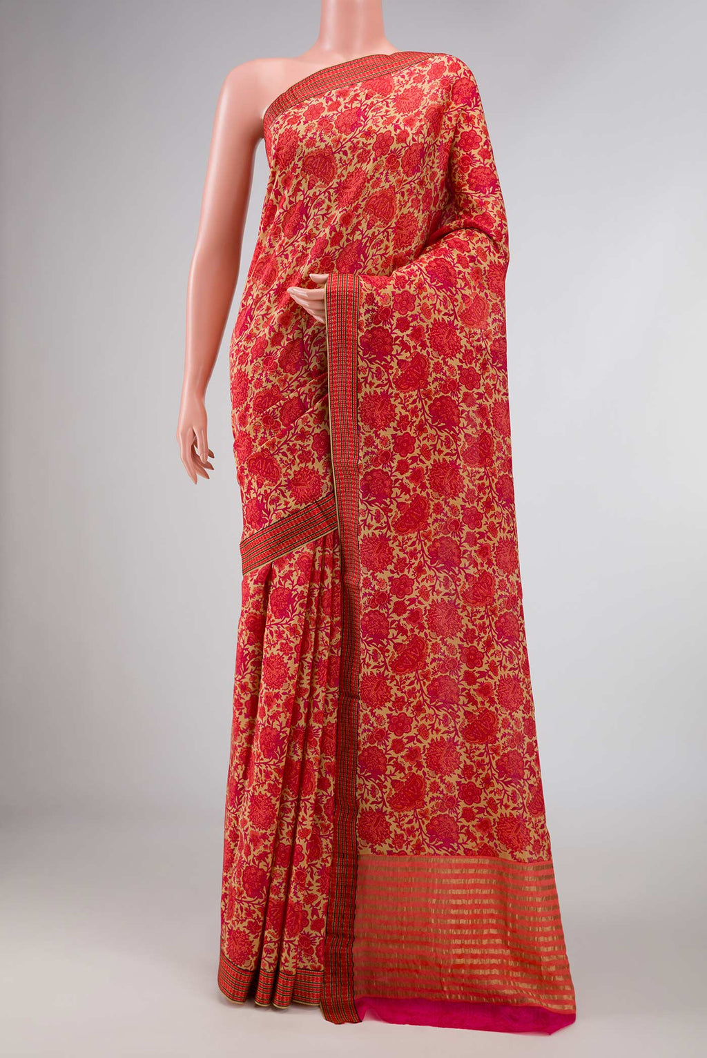 Beige Dual Tone Mysore Georgette Saree with Printed design on the body and Thread Border displayed on a mannequin