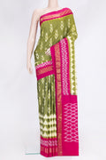 Mehandi Green Dual Tone Double Ikat Saree with Ikat Print on the body and Ikat Border.  displayed on a mannequin