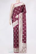 Maroon Dual Tone Banarasi Silk Saree with Zari Butta on the body and Zari Border.  displayed on a mannequin