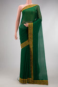 Bottle Green Chiffon Saree with Embroidery on the body and Thread Border.  displayed on a mannequin