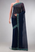 Navy Blue Dual Tone Chiffon Saree with Embroidery on the body and Embroidery Border.  displayed on a mannequin