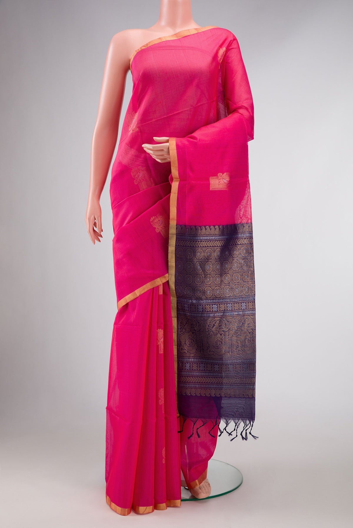 Dark Pink Dual Tone Silk Cotton Saree with Zari Butta on the body and Zari Border displayed on a mannequin