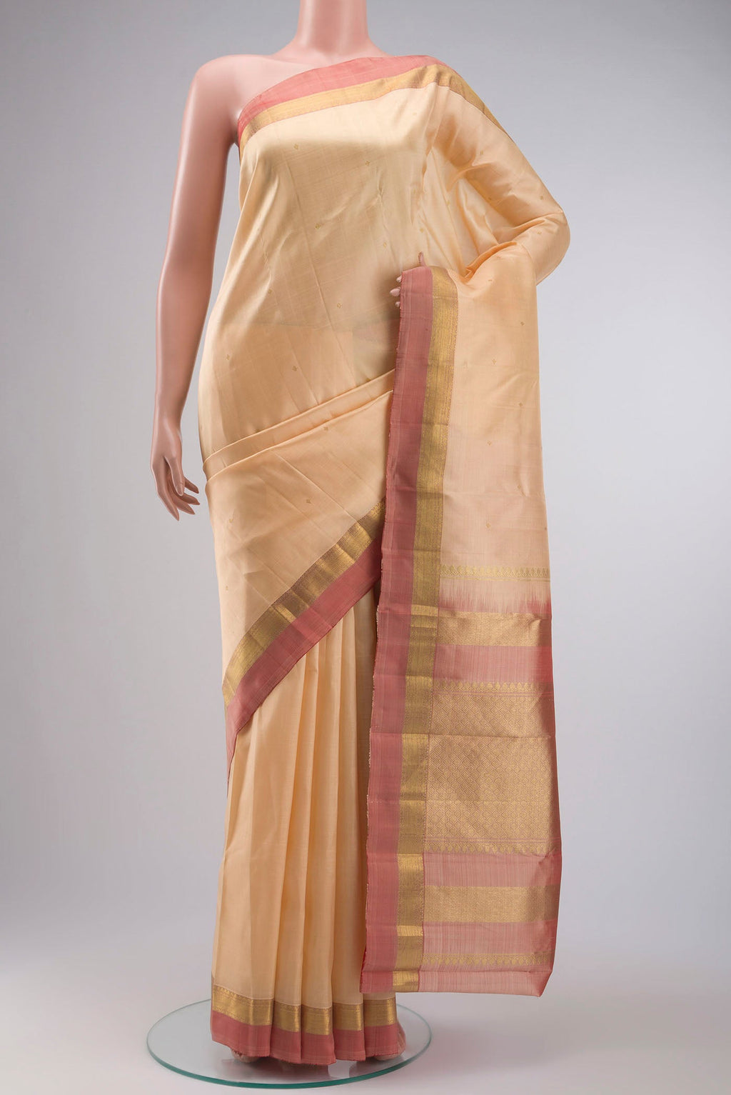 Sandal Kanchipuram Silk Saree with Zari Butta on the body and Zari Border displayed on a mannequin