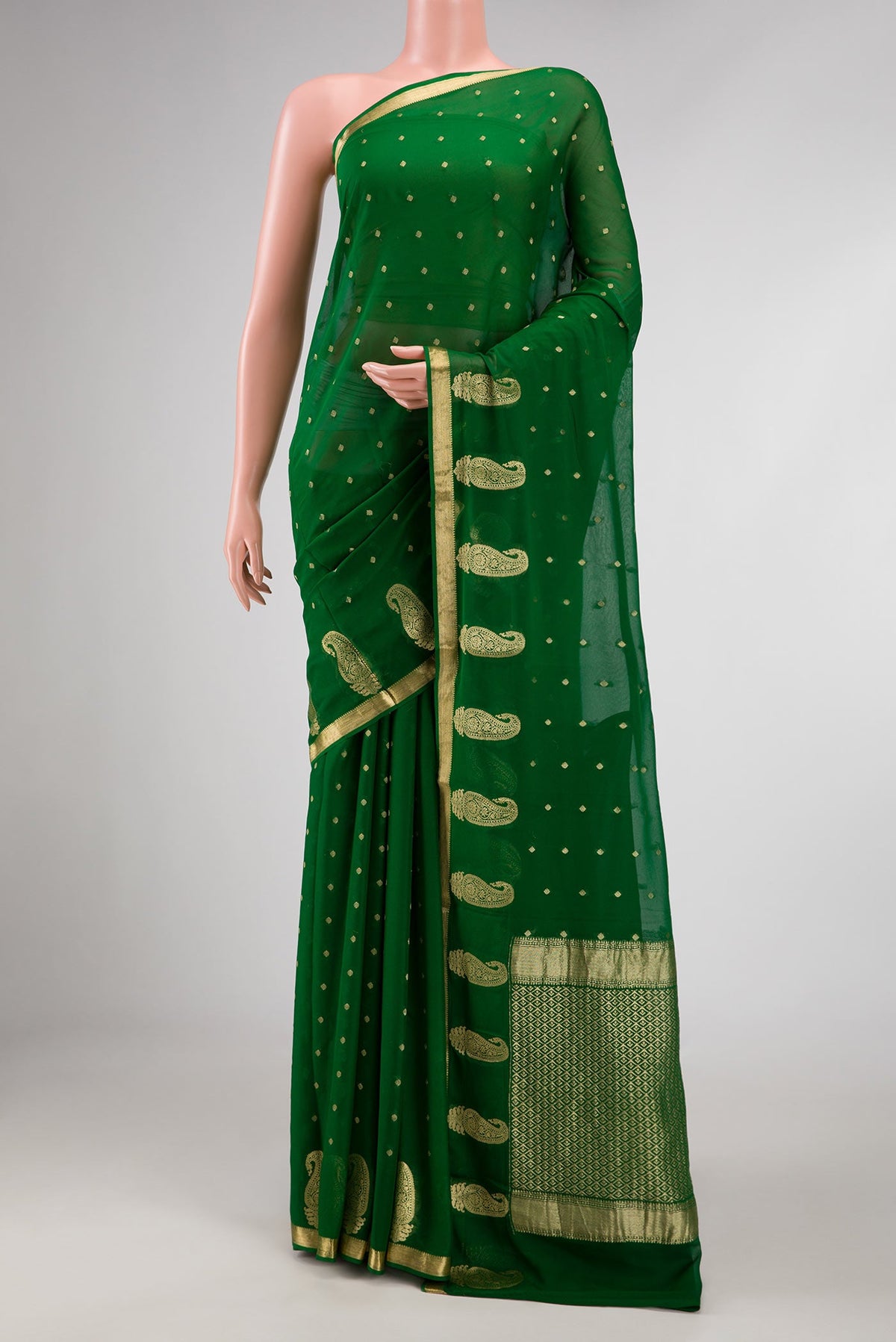 Green Dual Tone Mysore Georgette Saree with Zari Butta on the body and Zari Border displayed on a mannequin