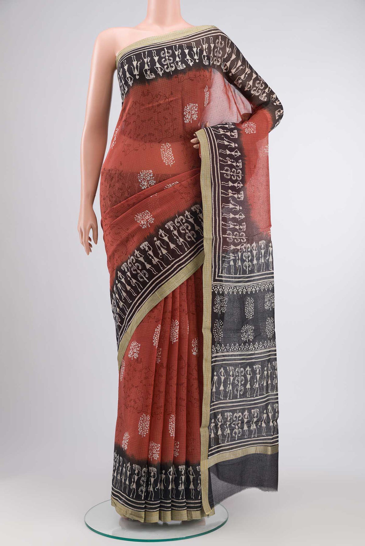 Coral Kota Cotton SareePrinted design on the body and Plain Border displayed on a mannequin