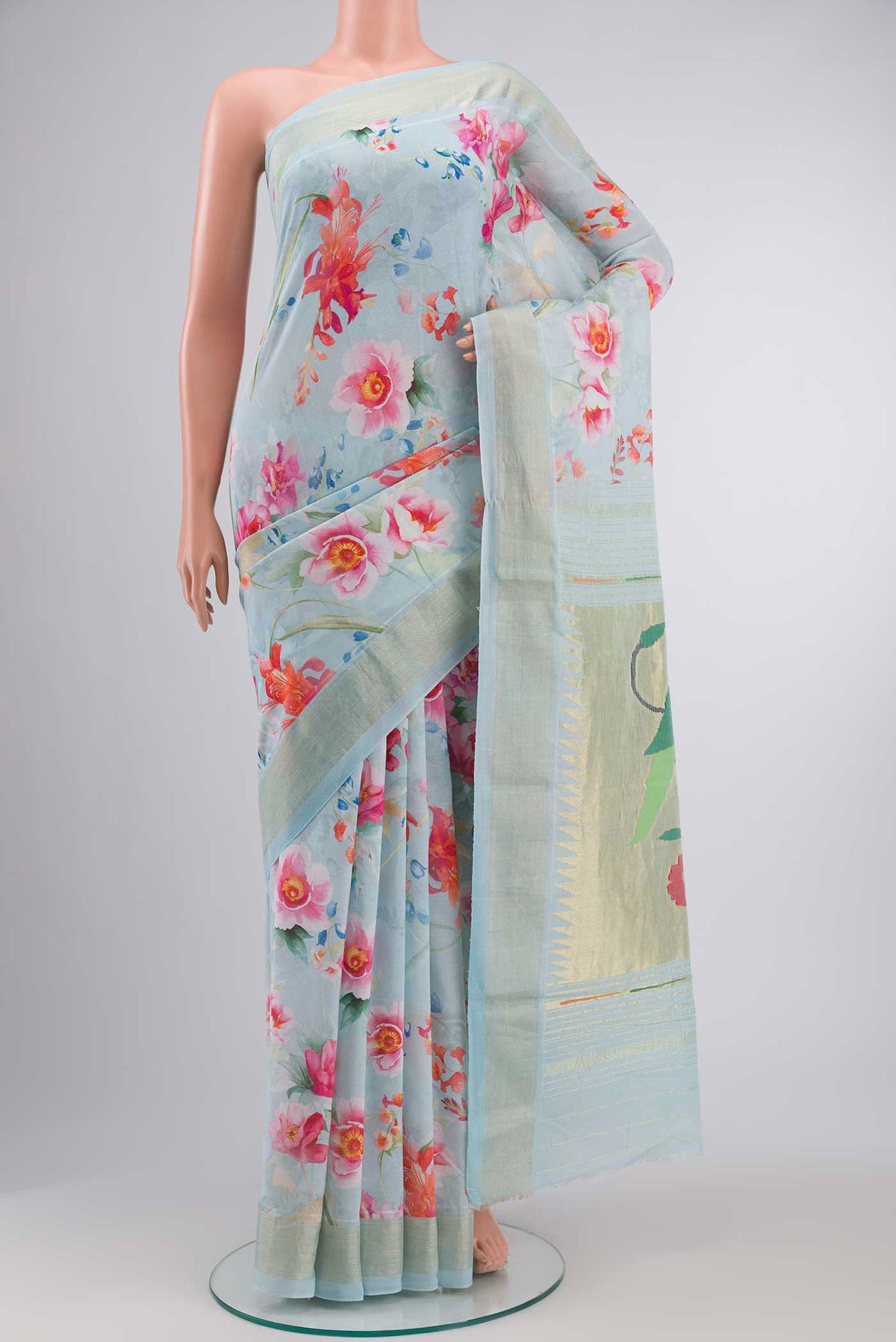 Blue Paithani Cotton SareePrinted design on the body and Zari Border displayed on a mannequin