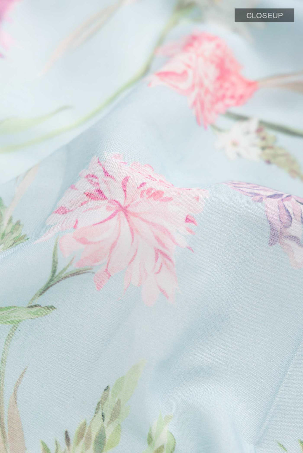 Close up of Blue Paithani Cotton SareePrinted design on the body and Zari Border displaying folds