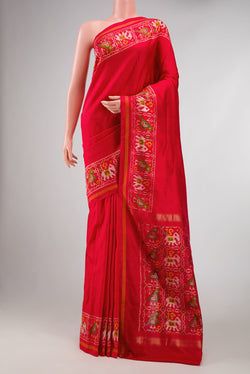 Red Dual Tone Double Ikat Saree with Plain Body and Ikat Border displayed on a mannequin