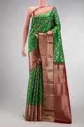 Green Dual Tone Kanchipuram Silk Saree with Zari Brocade on the body and Zari Border.  displayed on a mannequin