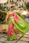 Model wearing a Pink Dual Tone Kanchipuram Silk Saree with Zari Brocade on the body and Zari Border.