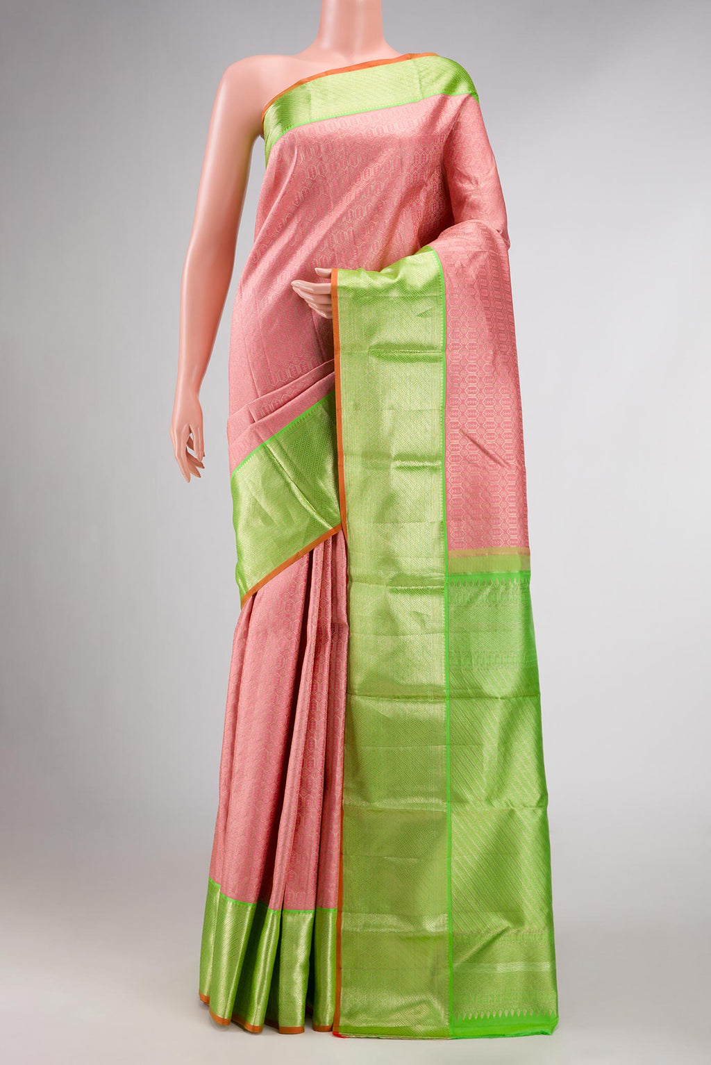 Pink Dual Tone Kanchipuram Silk Saree with Zari Brocade on the body and Zari Border displayed on a mannequin