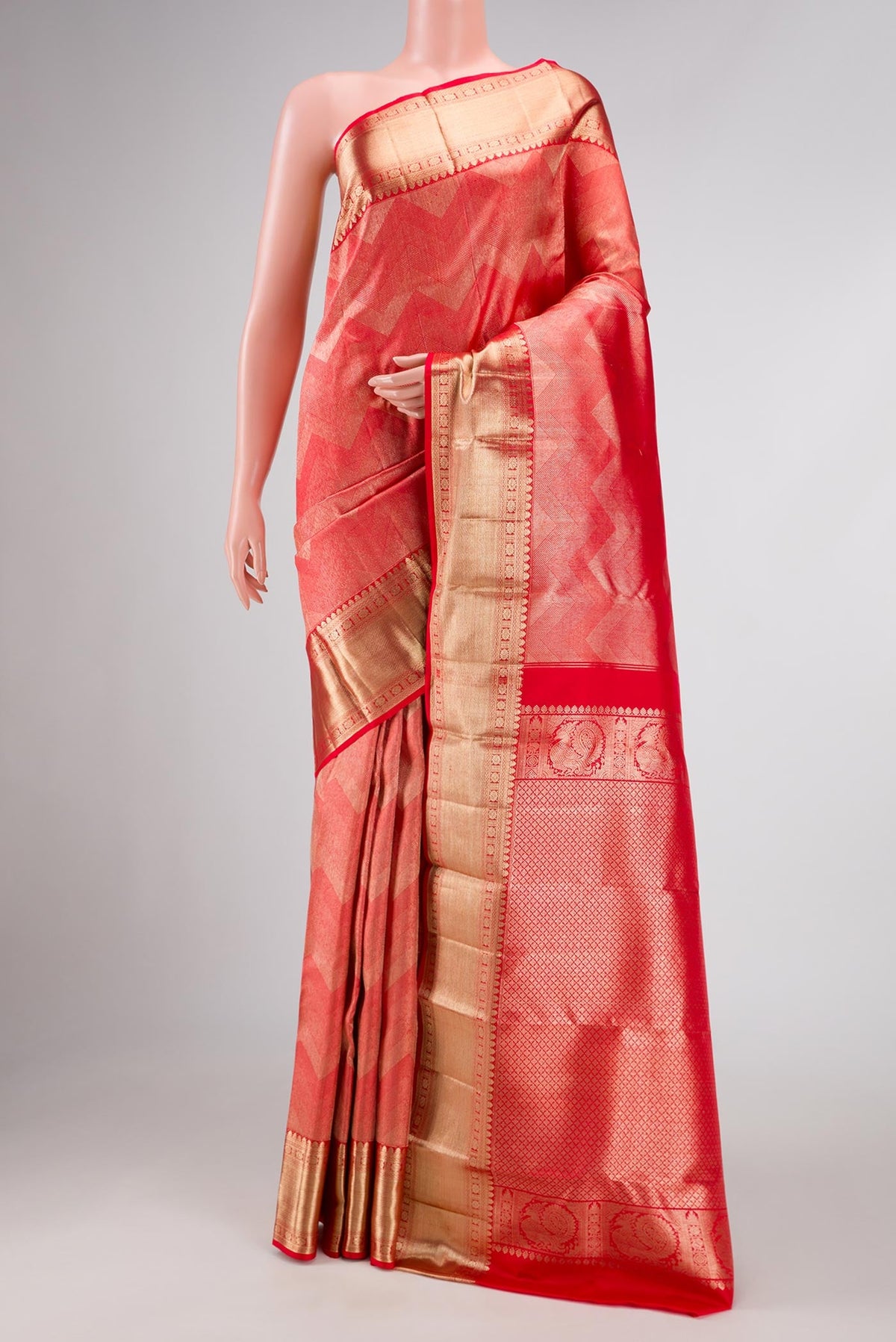 Dark Pink Dual Tone Kanchipuram Silk Saree with Zari Brocade on the body and Zari Border displayed on a mannequin