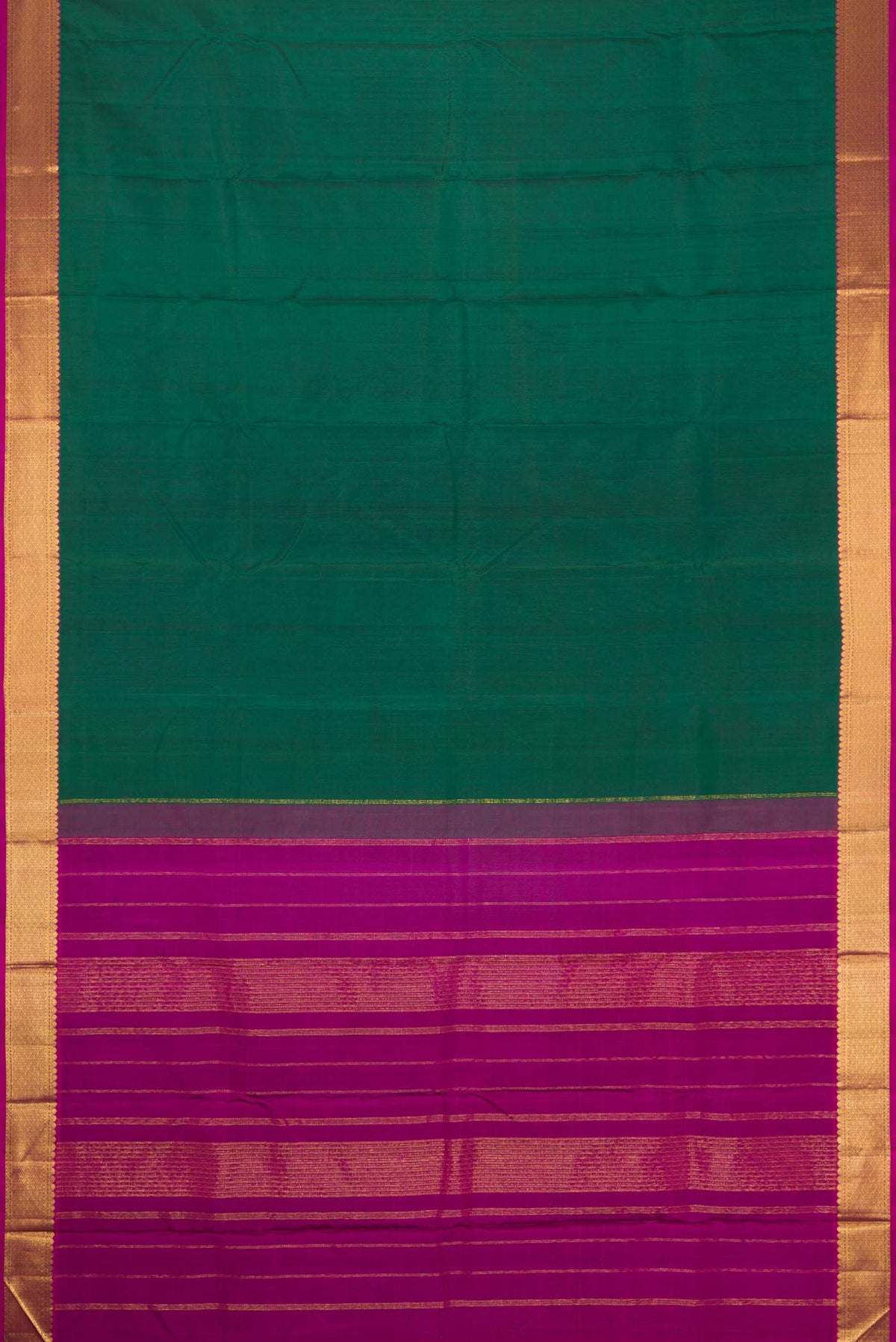 Flat view of Bottle Green Dual Tone Kanchipuram Silk Saree with Plain Body and Zari Border. 