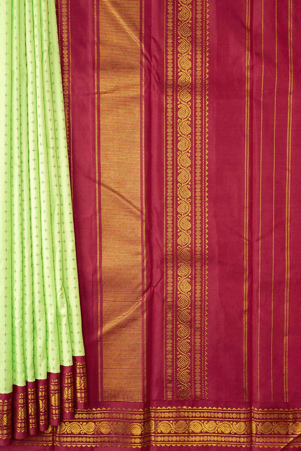 Pleats and pallu of Pure Silk Pure Zari Parrot Green Dual Tone Kanchipuram Saree with Thread Butta on the body and Ganga Jamuna Border
