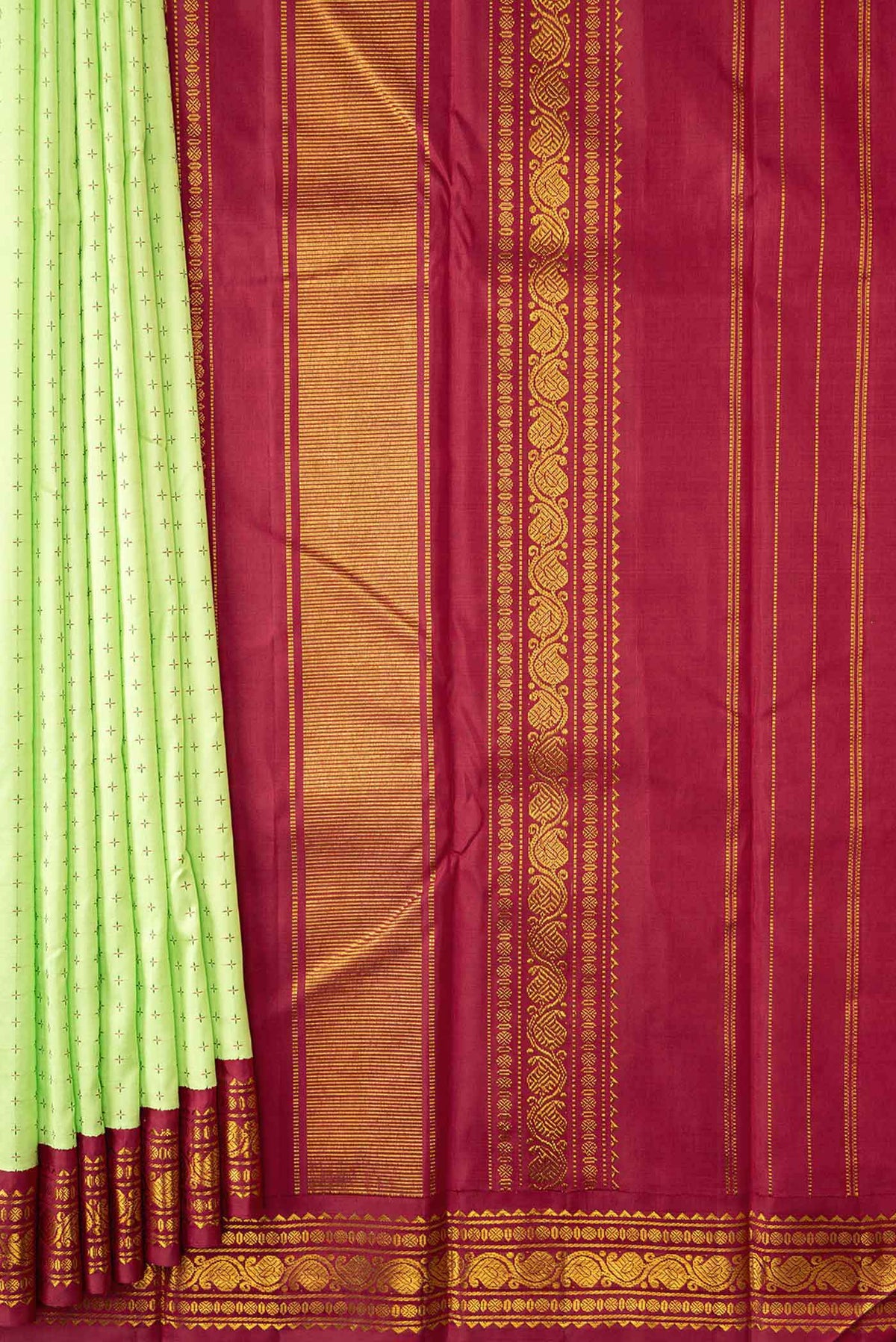 Pleats and pallu of Pure Silk Pure Zari Parrot Green Dual Tone Kanchipuram Saree with Thread Butta on the body and Ganga Jamuna Border