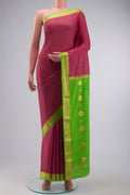 Pink Mysore Crepe Saree with Zari Butta on the body and Zari Border displayed on a mannequin