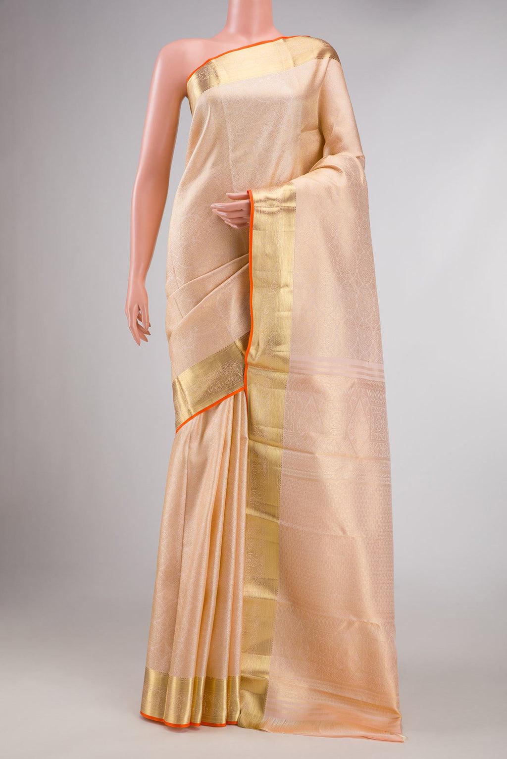 Golden Peach Dual Tone Kanchipuram Silk Saree with Zari Brocade on the body and Zari Border displayed on a mannequin