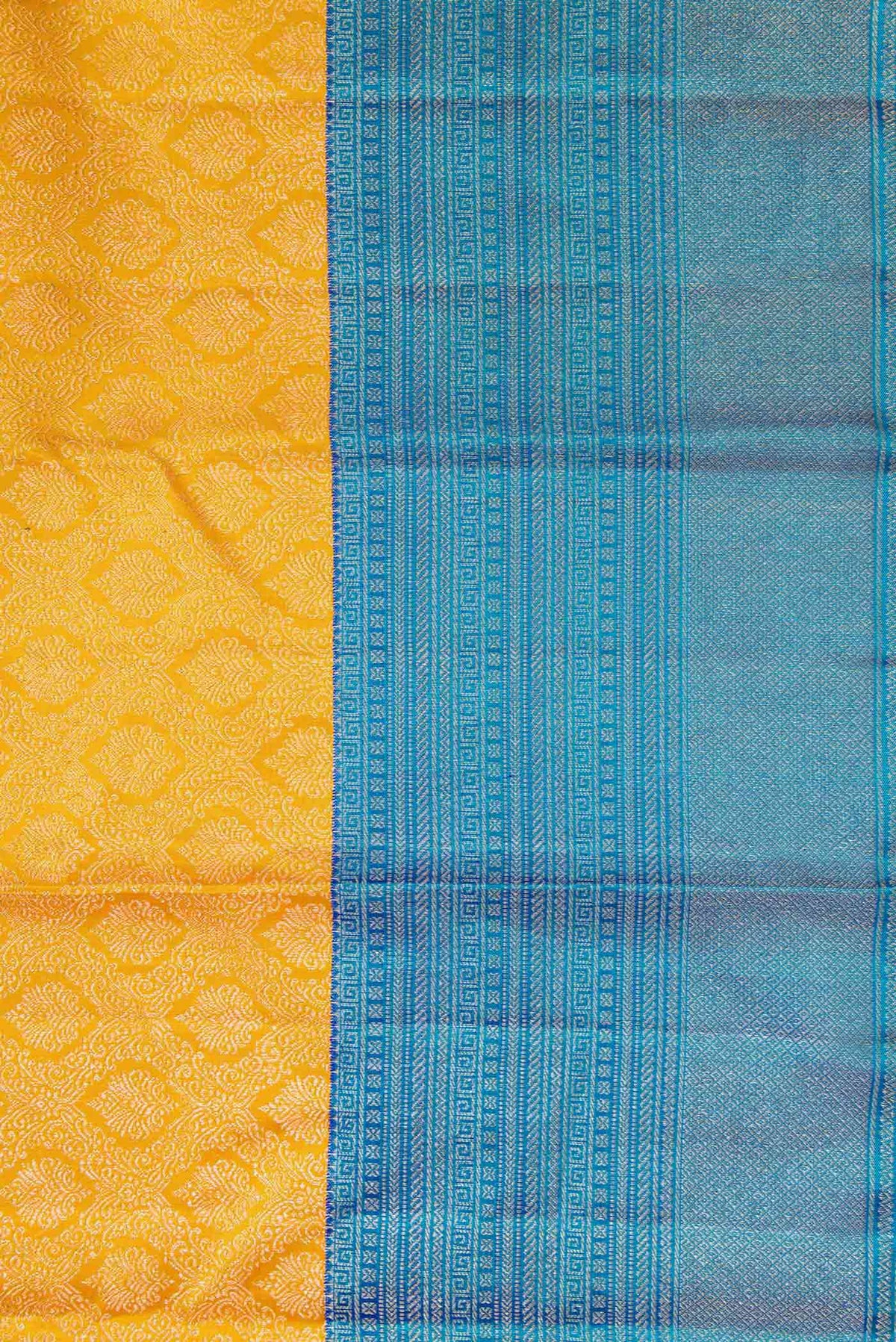 Border image of Yellow Kanchipuram Silk Saree with Zari Brocade on the body and Zari Border