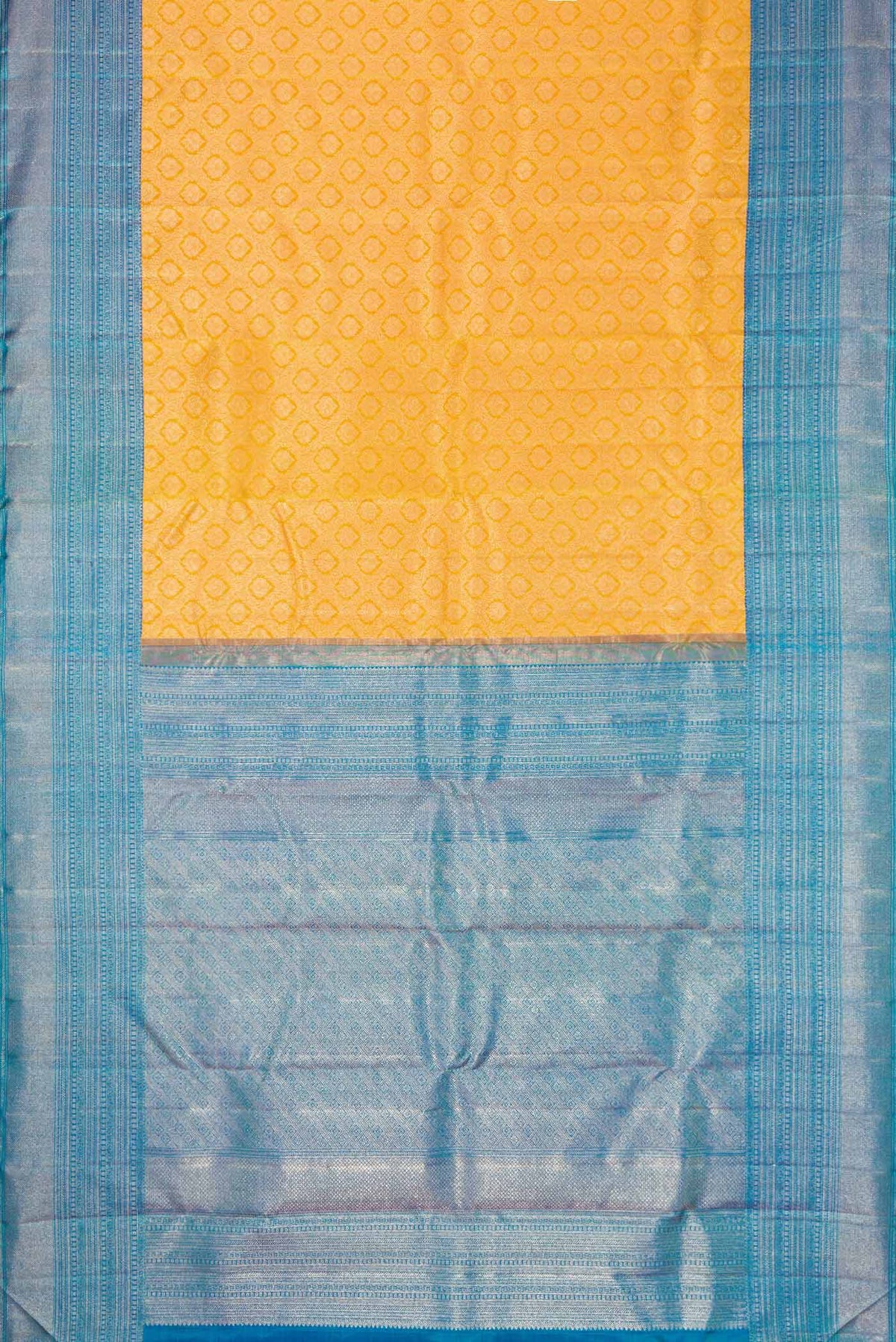 Flat view of Yellow Kanchipuram Silk Saree with Zari Brocade on the body and Zari Border