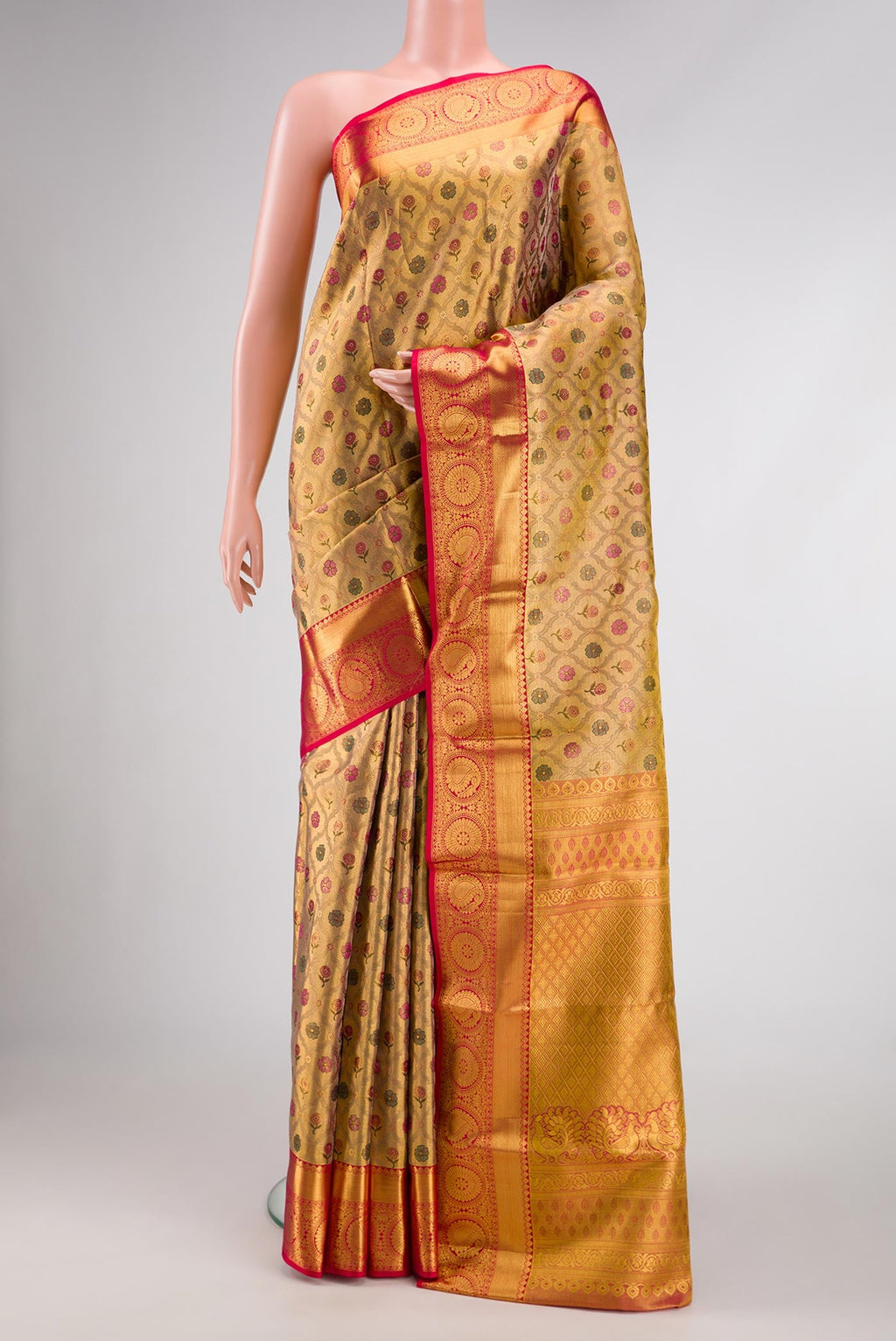 Gold Dual Tone Kanchipuram Tissue Silk Saree with Zari Brocade on the body and Zari Border.  displayed on a mannequin