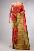 Red Kanchipuram Silk Saree with Zari Brocade on the body and Zari Border.  displayed on a mannequin