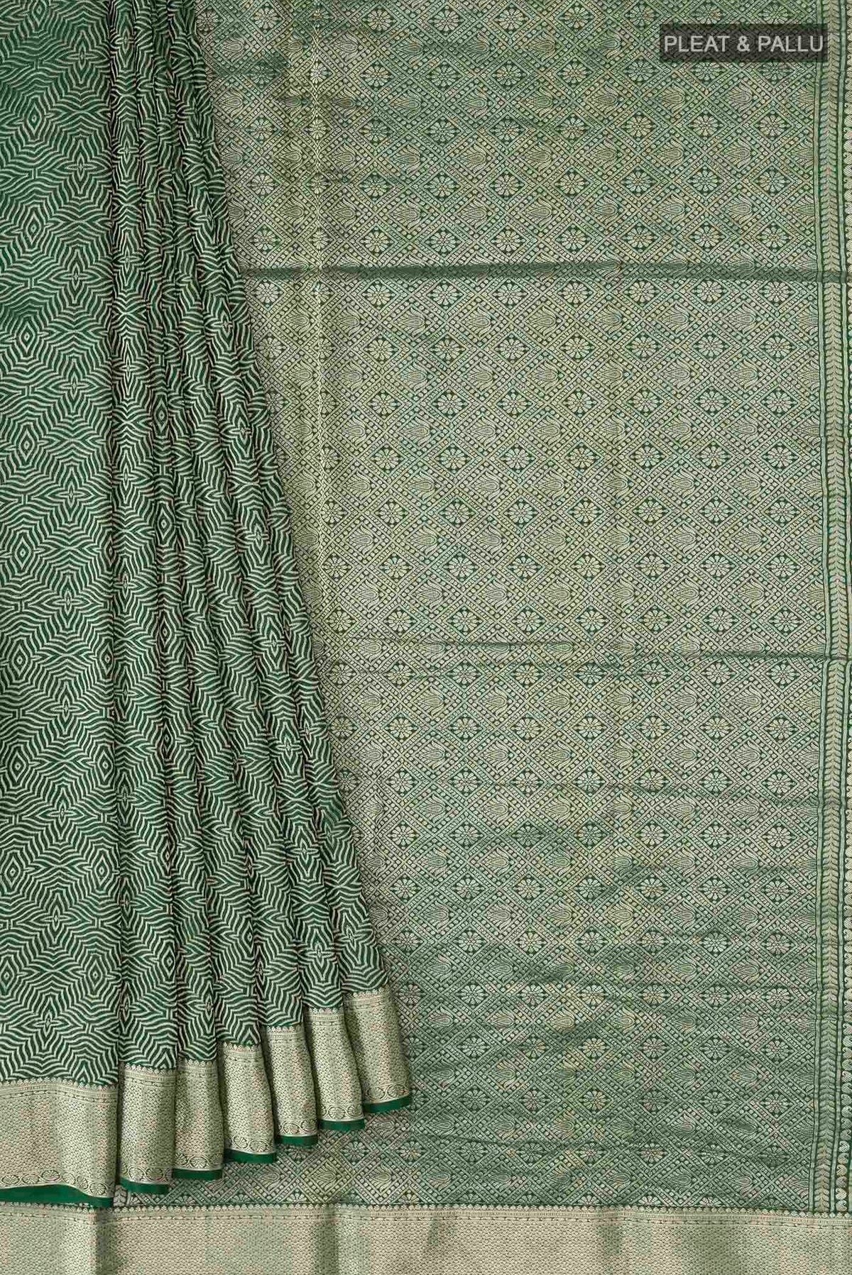 Pleats and pallu of Green Mysore Crepe Saree with Zari Brocade on the body and Zari Border