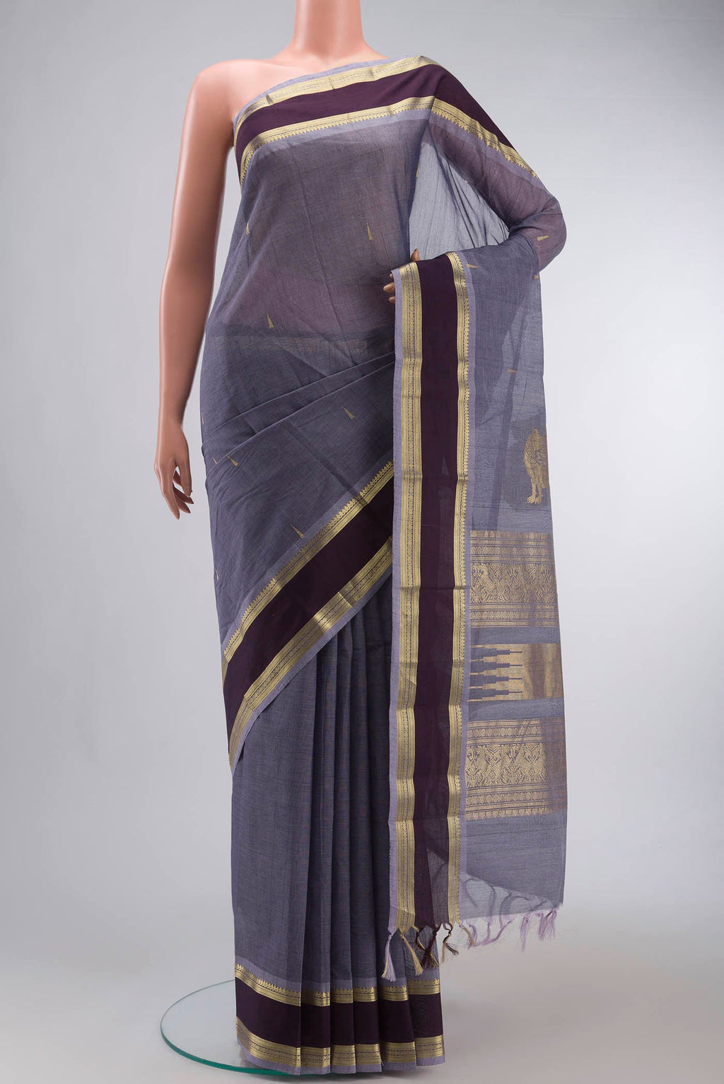 Lilac Kanchi Cotton Saree with Zari Butta on the body and Zari Border displayed on a mannequin
