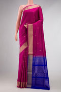 Light Magenta Dual Tone Soft Silk Saree with Zari Butta on the body and Zari Border displayed on a mannequin