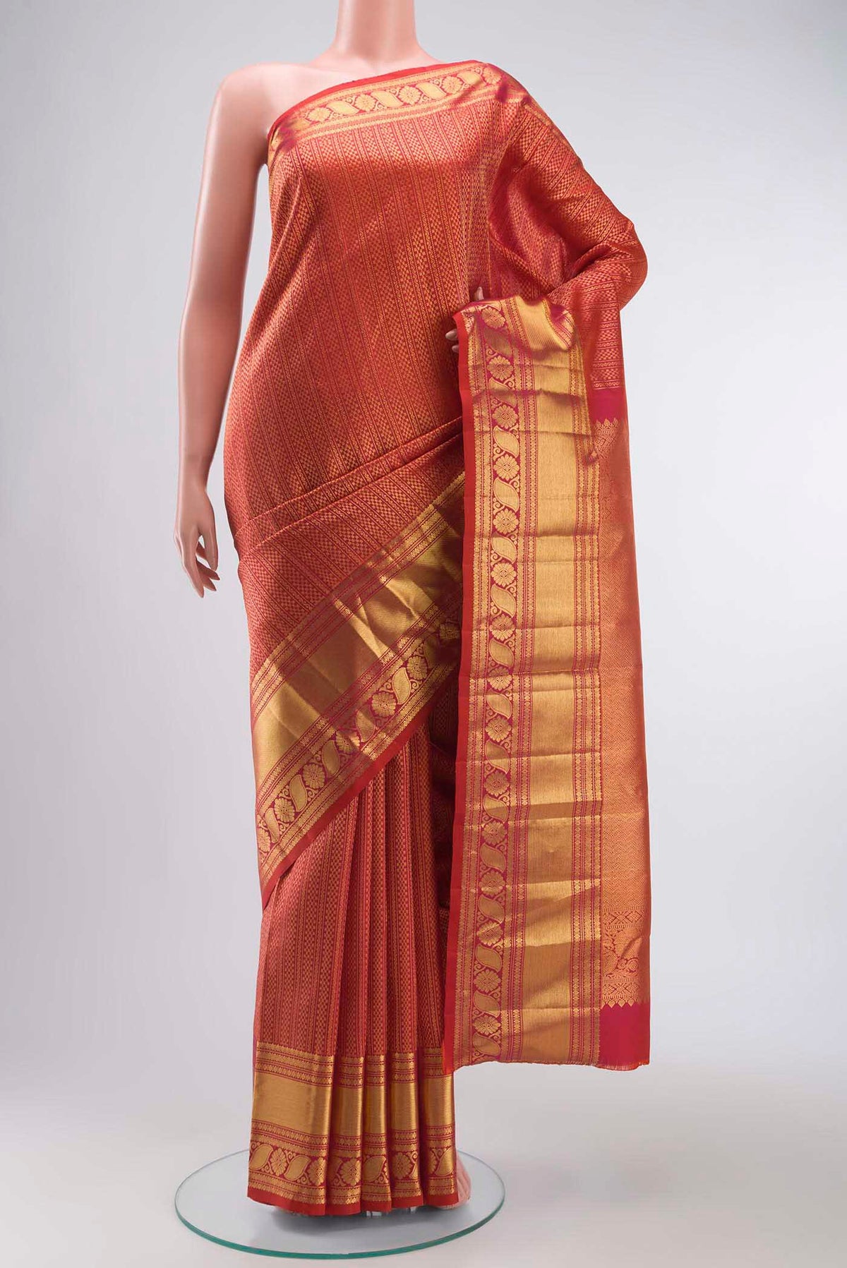Multi Color Kanchipuram Silk Saree with Stripes on the body and Zari Border displayed on a mannequin