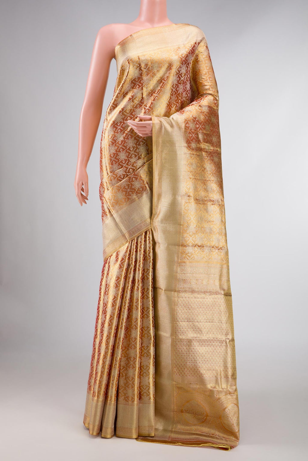 Gold Dual Tone Kanchipuram Tissue Silk Saree with Zari Brocade on the body and Zari Border displayed on a mannequin