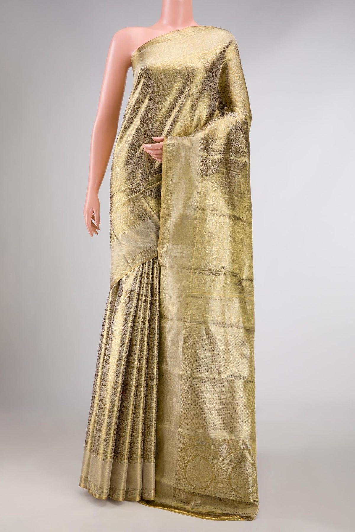 Gold Dual Tone Kanchipuram Tissue Silk Saree with Zari Brocade on the body and Zari Border displayed on a mannequin