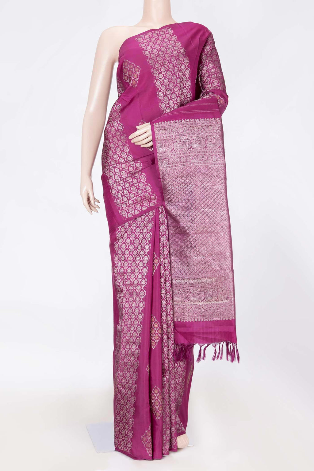 Magenta Dual Tone Kanchipuram Saree with Zari Butta on the body and Zari Border displayed on a mannequin