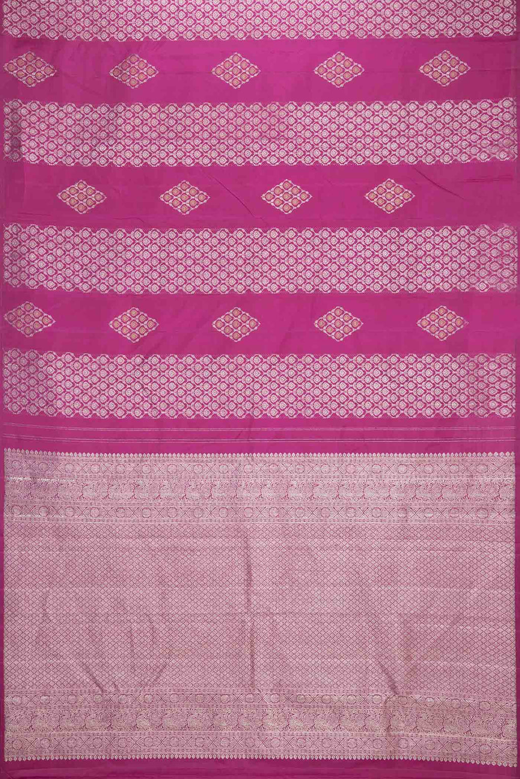 Flat view of Magenta Dual Tone Kanchipuram Saree with Zari Butta on the body and Zari Border