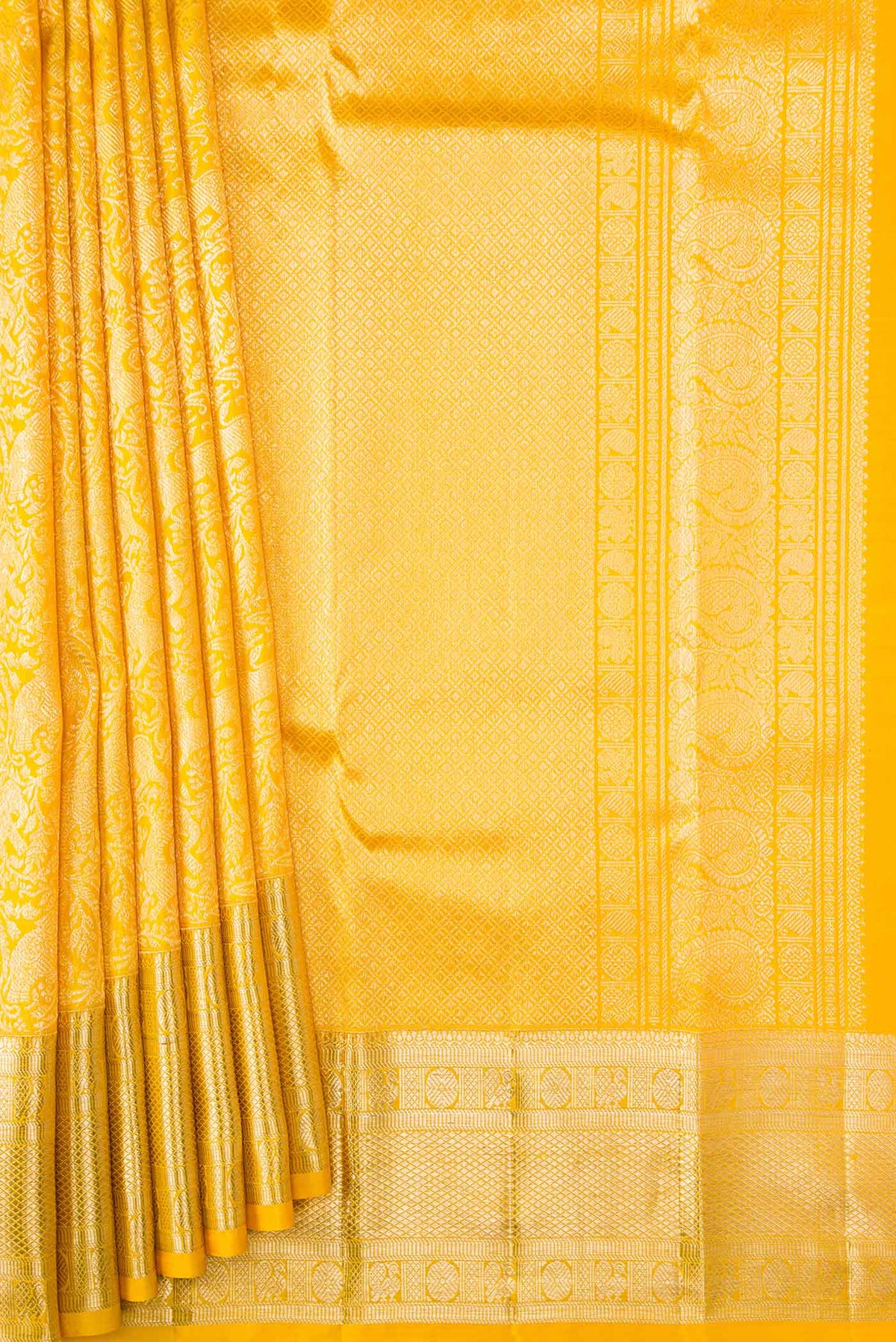 Pleats and pallu of Yellow Dual Tone Kanchipuram Silk Saree with Zari Brocade on the body and Zari Border