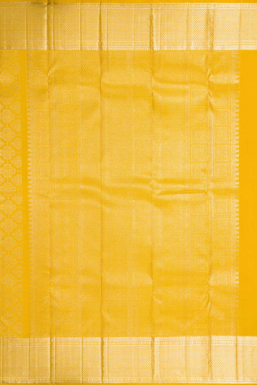 Close up image of the pallu of Mustard Dual Tone Kanchipuram Silk Saree with Zari Brocade on the body and Zari Border