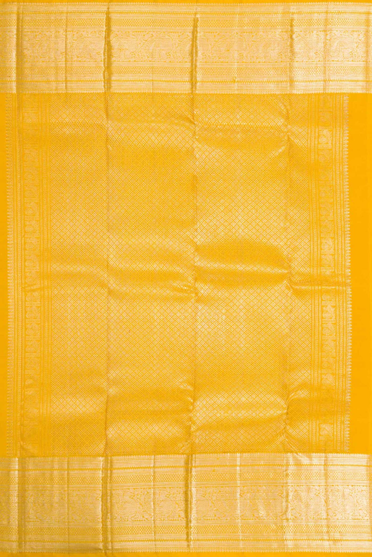 Close up image of the pallu of Yellow Dual Tone Kanchipuram Silk Saree with Zari Brocade on the body and Zari Border
