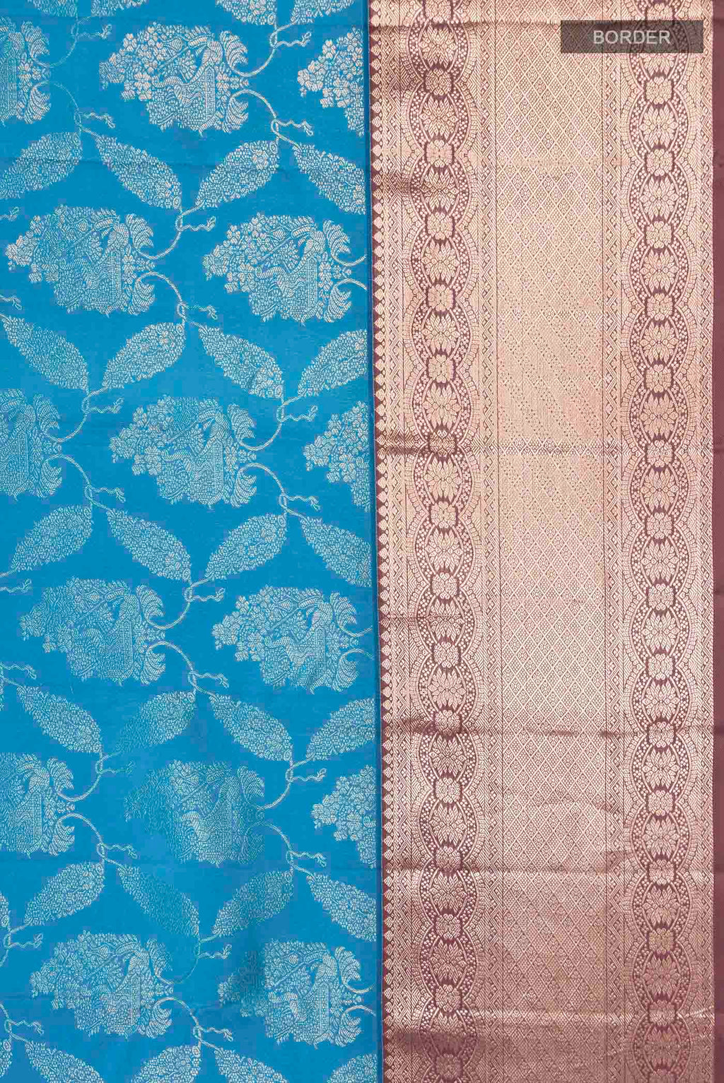 Border image of Blue Kanchipuram Silk Saree with Zari Butta on the body and Zari Border
