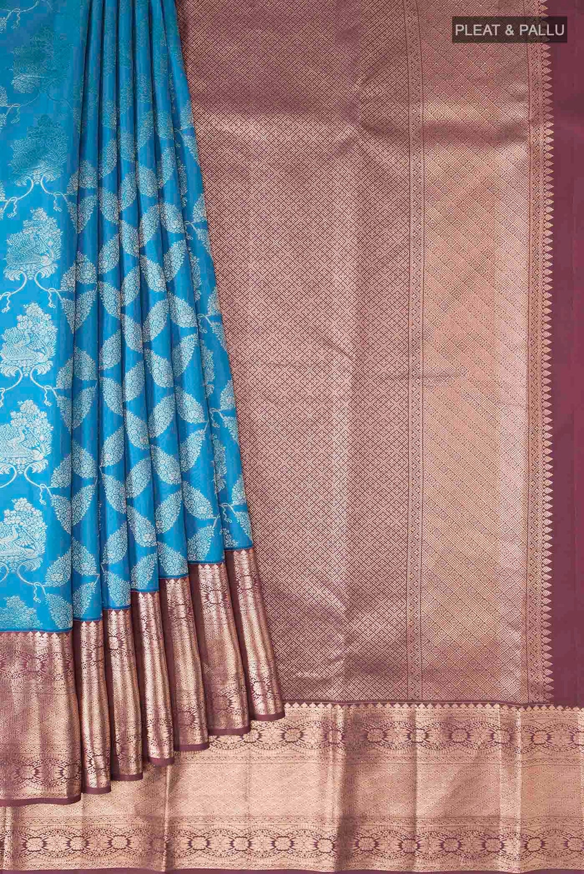 Pleats and pallu of Blue Kanchipuram Silk Saree with Zari Butta on the body and Zari Border